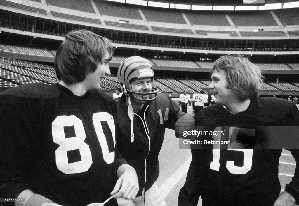 Bengals Players Conversing in Stadium
