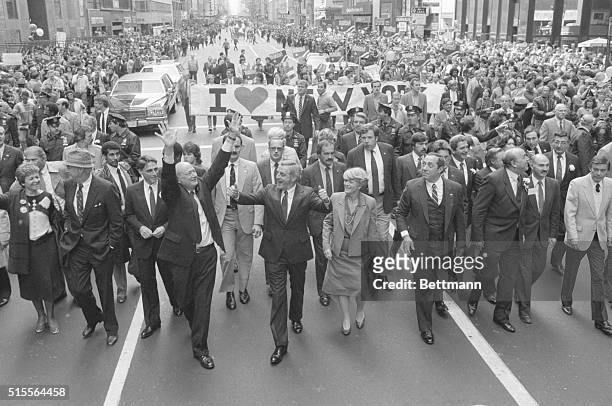 New York, NY: Walking up Fifth Avenue 10/8 in the Columbus Day Parade are : Governor Mario Cuomo, Democratic Presidential Candidate Walter Mondale ,...