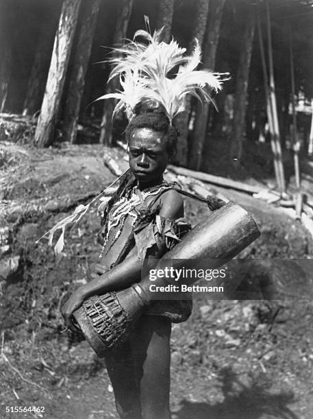 New Guinea: The Signalling Drum Or Garamut, Sepik River Valley. Each village has its long-distance signalling drum hollowed out of a tree trunk and...