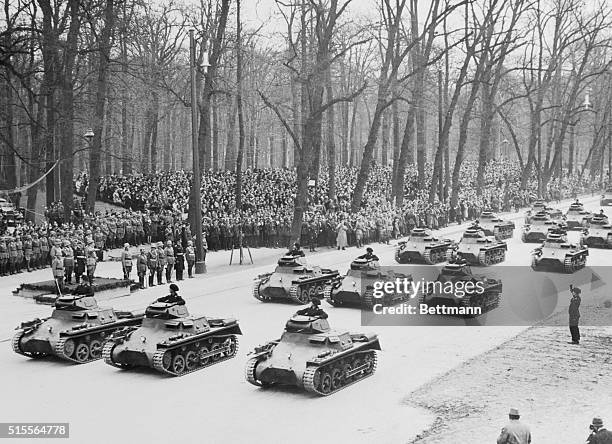 Germany is New Two-Man Tanks. Remilitarized Germany paid homage to Reichfuehrer Hitler, on his 47th birthday, as its supreme commander, by staging...