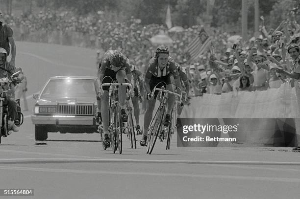 Head down and driving to the finish, Connie Carpenter, the American bicyclist, from Boulder, Colorado, , edges out teammate Rebecca Twigg, , to win...