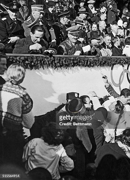 One hundred and fifty thousand spectators were present at Garmisch-Partenkirchen, Germany, when Reichsfuhrer Hitler brought the Winter Olympics to a...