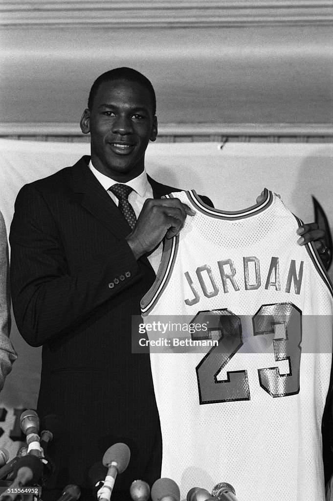 Michael Jordan Displaying His Team Jersey