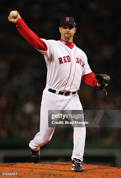 Pitcher Tim Wakefield of the Boston Red Sox throws a pitch against the St. Louis Cardinals in the first inning during game one of the World Series on...