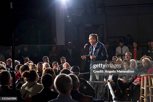 Republican presidential candidate Ohio Gov. John Kasich speaks to supporters at a town hall meeting at Brilex Industries, Inc. On March 14, 2016 in...