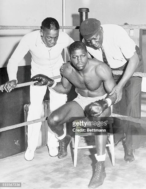Leroy Haynes, who takes a crack at former heavyweight champion Primo Carnera May 27, at Brooklyn, New York, in a ten-round test, eagerly awaits the...