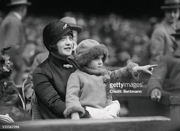 Babe Ruth's wife, Claire is shown with daughter Dorothy observing at Yankee Stadium.