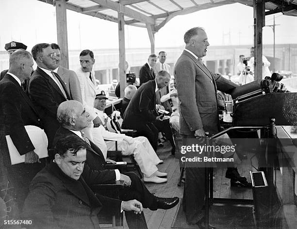 President Roosevelt speaking at the dedication ceremonies on Randall's Island, just preceding the opening of the Triboro Bridge in New York, the new...