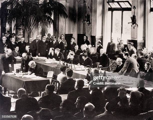 Lausanne, Switzerland- The Lausanne pact slowed post war history of Europe. Prime Minister Ramsay MacDonald of Great Britain signs.