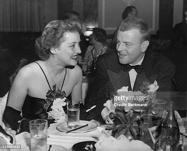 Bette Davis, Hollywood star, and her husband Arthur Farnsworth are shown here.