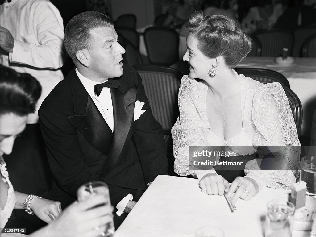 Performer Bette Davis Sitting With John Farnsworth at Table