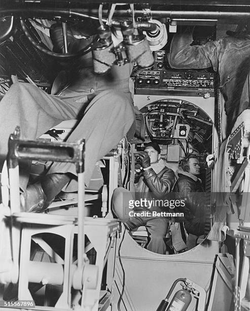 Northern Atlantic...A view from the pilot's control looking amidships in the radio and navigation section of one of the planes of the U.S. Navy...