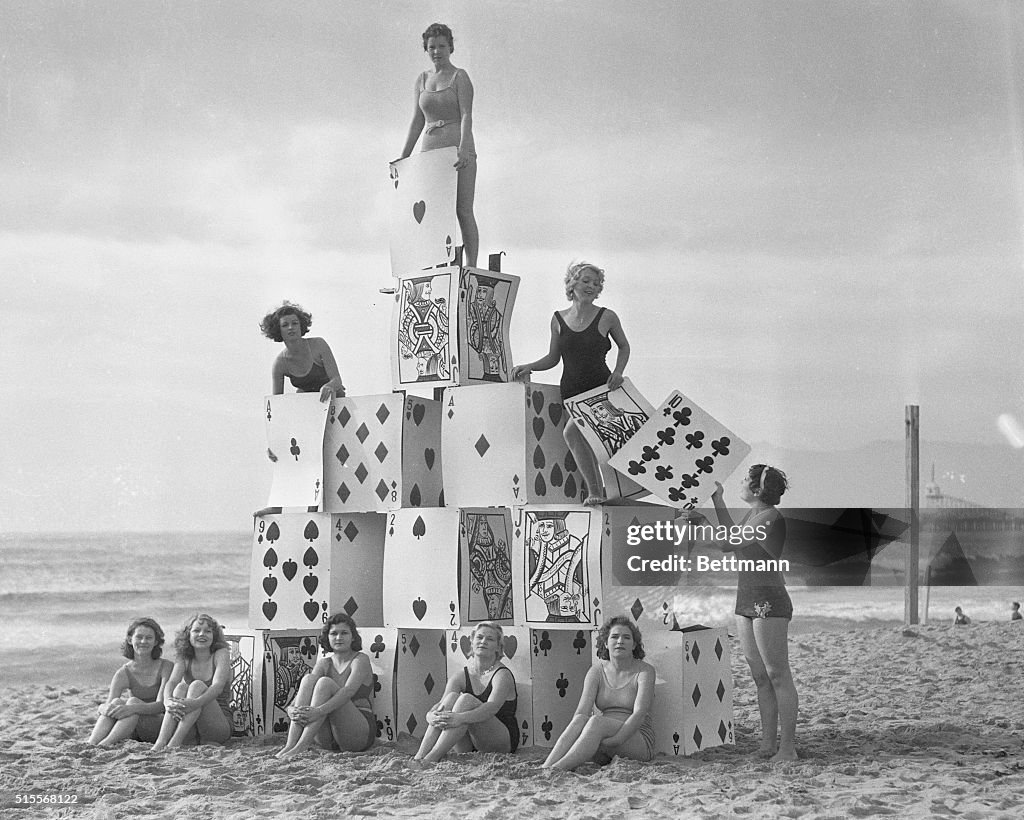 Girls Building Giant House of Cards