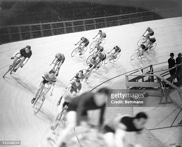 The best bicycle teams of America, Europe and Australia are banking around the North turn at Madison Square Garden during the second day of the...