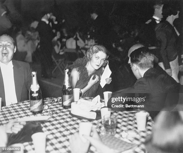 Prominent socialite Doris Duke with friends at the May Ball held in 1933, in New York, for the benefit of Mrs. Franklin D. Roosevelt's Canteens for...