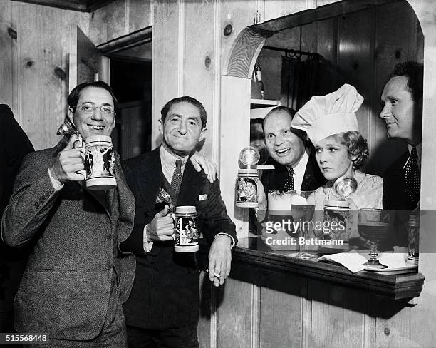 Hollywood, Cal.: Film stars, directors and executives celebrated the return of beer when they met in the bungalow office of M.C. Levee, manager of...