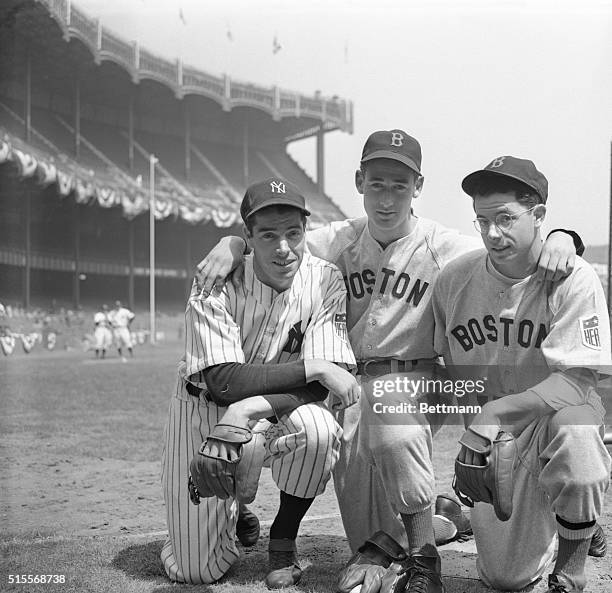 Two of the brothers DiMaggio, Joe, left, of the New York Yankees, and Dominik, right, of the Boston Red Sox, get together with Boston's star...