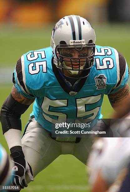 Dan Morgan of the Carolina Panthers waits for a play against the San Diego Chargers in a game on October 24, 2004 at Bank Of America Stadium in...