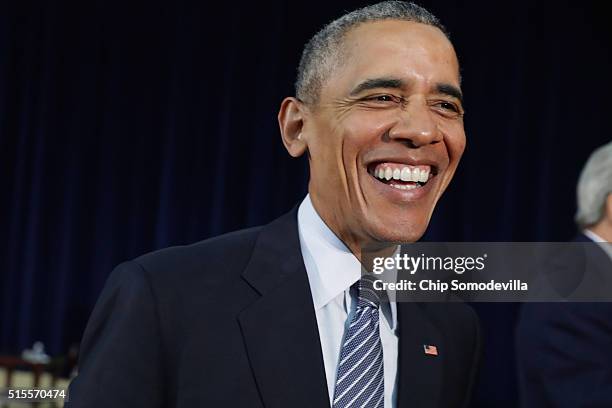 President Barack Obama leaves after addressing the Chief of Missions Conference in the Dean Acheson Auditorium at the Harry S Truman State Department...