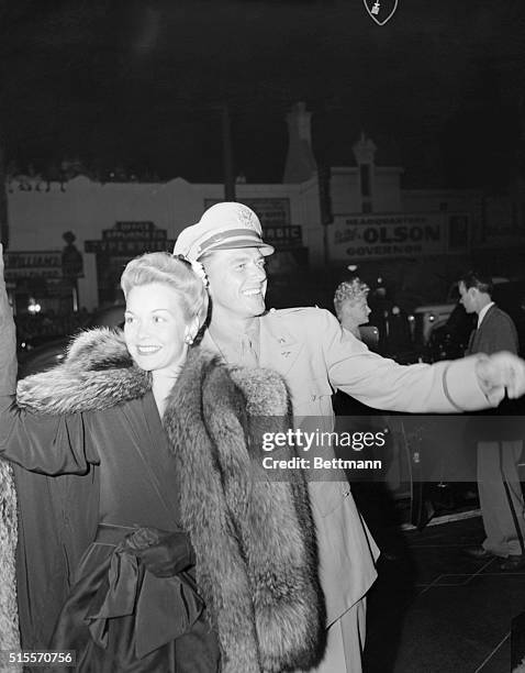 Hollywood, California: Premiere of the The Pride of the Yankees at the Pantages Theater in Hollywood, Calif. Lieut. Ronald Reagan and his wife, Jane...