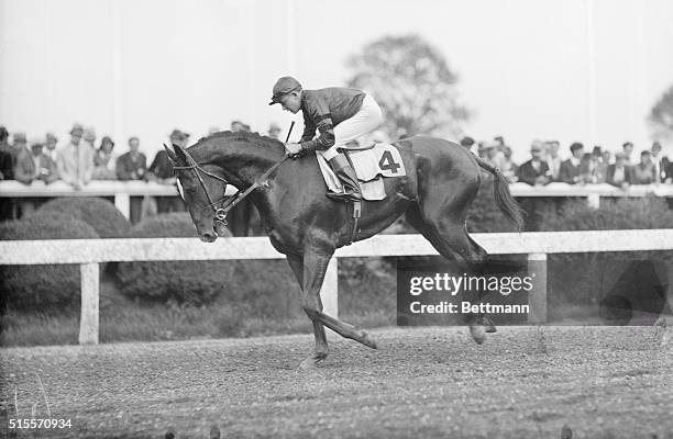 Winner of the Classic and Jockey. Pimlico, Md.: Head Play, owned by Mrs. Silas Mason, is shown with jockey Charley Kurtsinger, after his sensational...