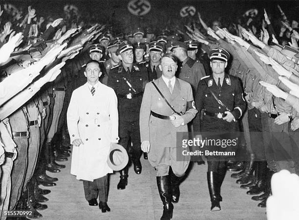 Berlin, Germany- Chancellor Adolf Hitler & Minister of Propaganda Joseph Goebbels receiving the cheers and Nazi salutes of their followers in the...