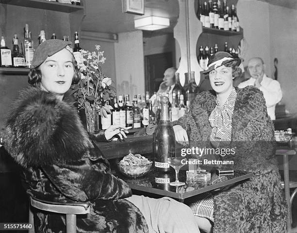 Mayfair's Younger Matrons Enjoy Their "Cocktail Hour" New York: Mrs. William Gillette Bird , and Mrs. Henry Sanford, enjoy their cocktails at...