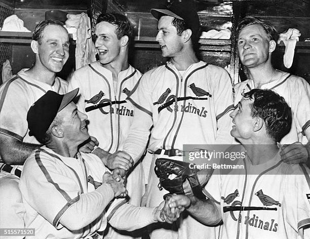 The Second One Was Better. St. Louis, Missouri: Happy Red Birds congratulate Johnny Beazley after he won the second game of the World Series with a...