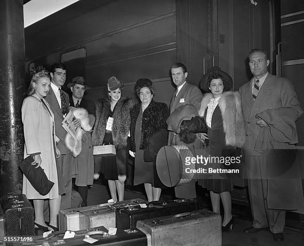 Members of the New York Yankees and their wives arrive in St. Louis on the eve of the World Series opener with the St. Louis Cardinals. Left to...
