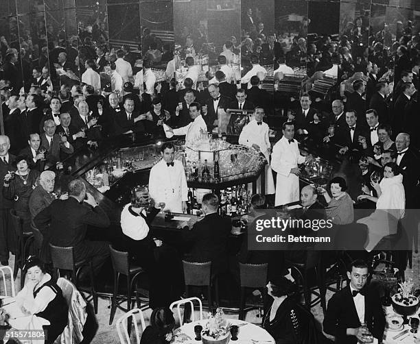 Men and women crowd a fancy club on Park Avenue to celebrate the end of Prohibition.