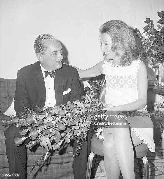 Lee Bouvier Radziwill , sister of Jacqueline Bouvier Kennedy, in her dressing room with her husband Stanislaus after her first acting role in...