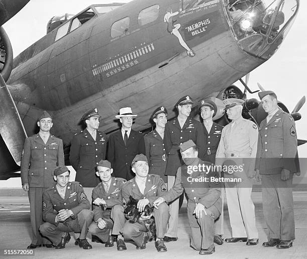 Battle-scarred, but hardy enough to carry her original crew back home, the Flying Fortress "Memphis Belle" winged into National Airport in Washington...