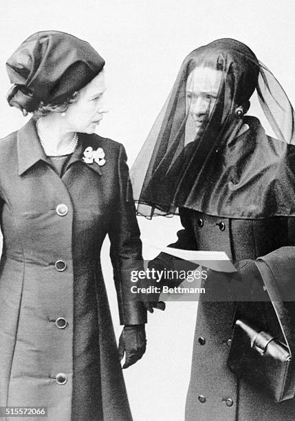 Queen Elizabeth II speaks with the Duchess of Windsor outside Windsor Castle June 5th following funeral services for the Duke of Windsor. Two hundred...