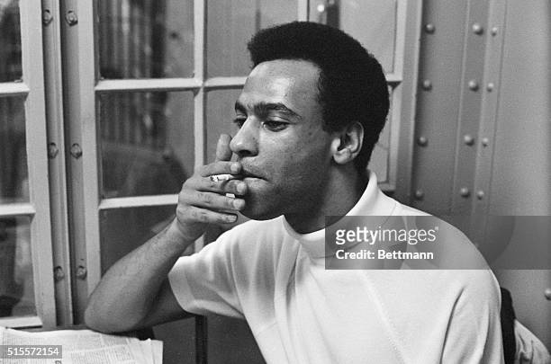 Oakland, California: Huey Newton puffs on a cigarette in holding cell 9/5, while a jury deliberated his fate. Newton, founder of the militant Black...