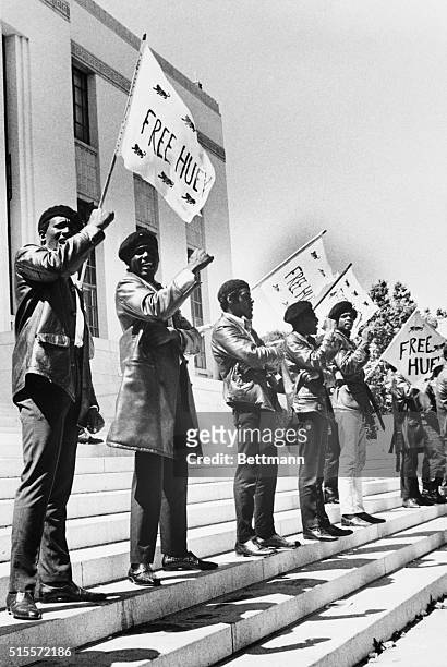 Members of the Black Panther Party demonstrate on the steps of the Alameda County Courthouse in Oakland, California. They are calling for the release...