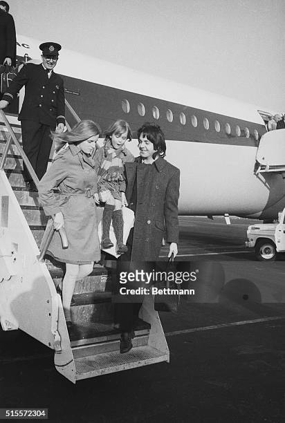 Newlyweds Paul and Linda McCartney, together with 6-year-old Heather, Linda's daughter by a former marriage, arrive in New York for a three-day visit...
