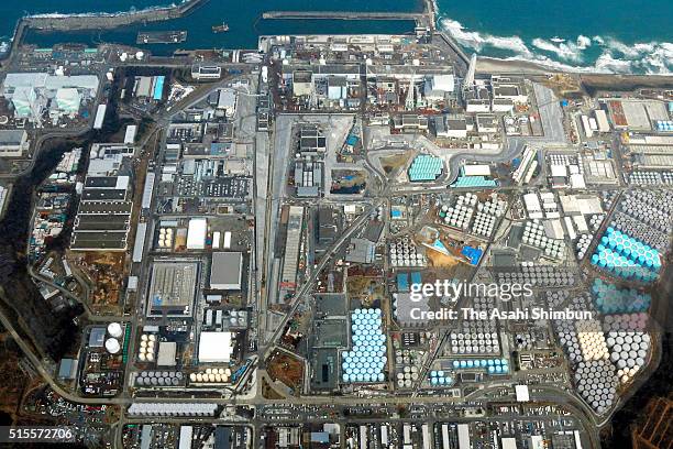 In this aerial image, Tokyo Electric Power Co's Fukushima Daiichi Nuclear Power Plant on March 12, 2016 in Okuma, Fukushima, Japan. The No.1 reactor...