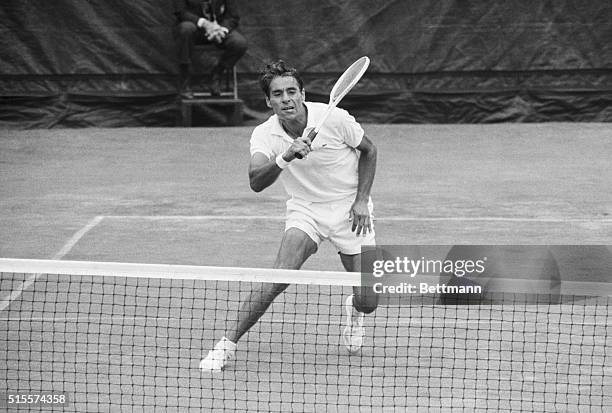 New York: The picture of determination, Pancho Gonzalez battles Tom Okker in quarterfinal match of the $100,000 U.S. Open Tennis Championships at...