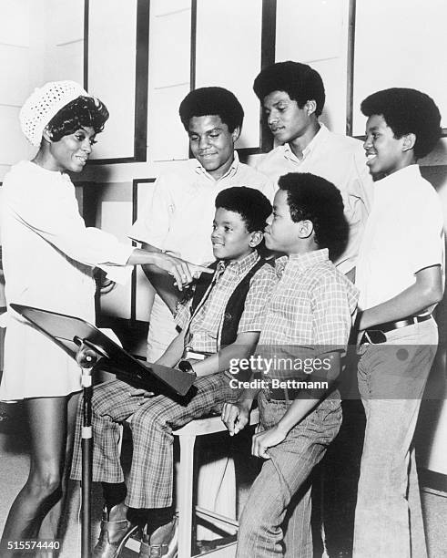 Diana Ross, left, with The Jackson Five, : Tito, Jackie, and Jermaine, and Michael and Marlon.