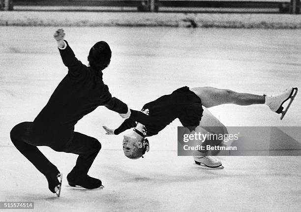 Americans Ken Shelley and Jojo Starbuck perform a death spiral in the pairs' compulsory figures competition at the 1972 Winter Olympics in Sapporo,...