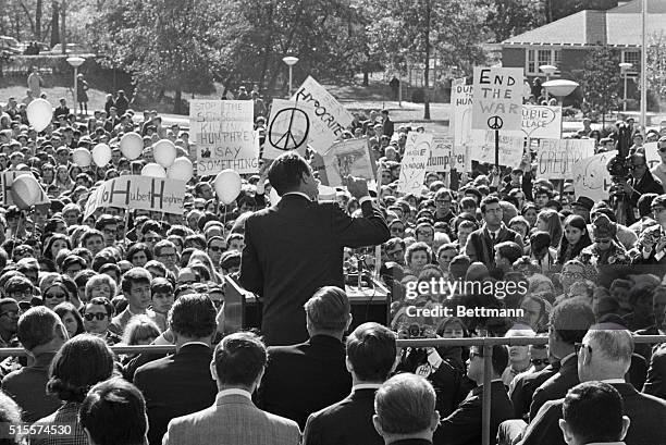 Teaneck, NJ: Vice President Hubert H. Humphrey is greeted by a not too friendly number of placards as he addresses students at Fairleigh Dickinson...