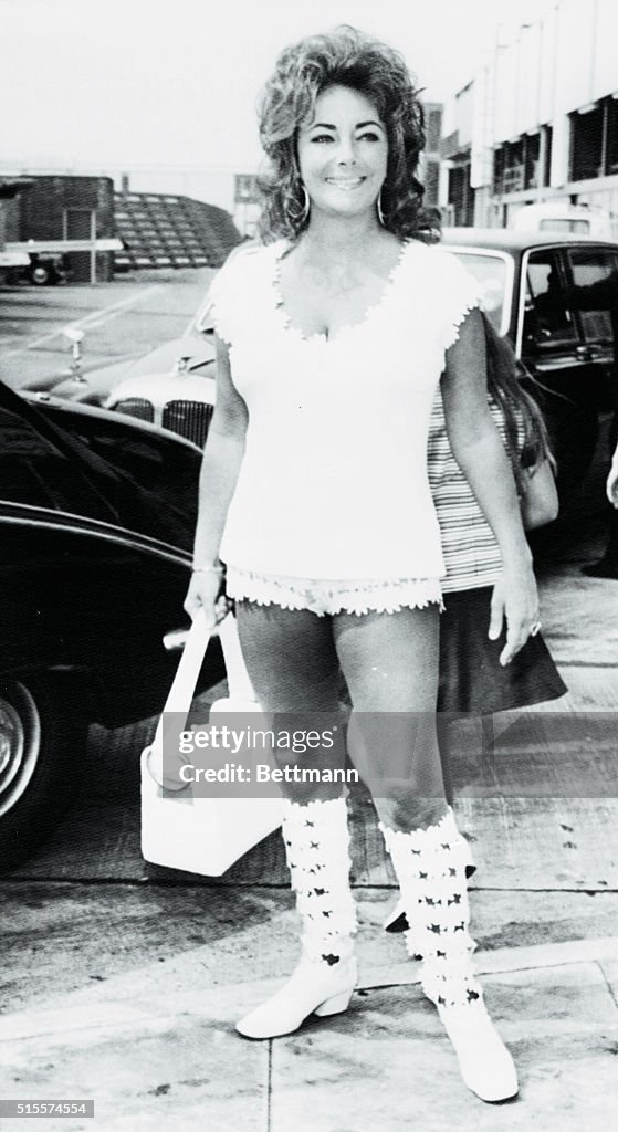 Liz Taylor Arrives At London Airport