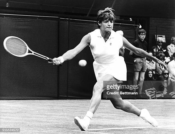 Australian Margaret Court races to return the ball to Billie Jean King during the Wimbledon women's singles finals on July 3, 1970.