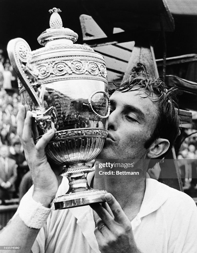 John Newcombe Kisses Wimbledon Trophy