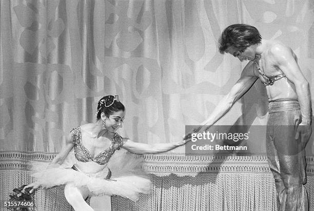 Dame Margot Fonteyn and Rudolf Nureyev acknowledge applause during a curtain call after a gala performance of the Royal Ballet at the Metropolitan...