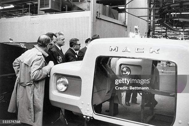 Soviet officials inspect the assembly of Mack Trucks at the company plant in Allentown, Pennsylvania. In 1971 the president of the Mack Truck company...