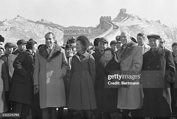 President and Mrs. Nixon and Secretary of State William Rogers visit the Great Wall of China Feb. 24. Standing between Mrs. Nixon and Rogers are...