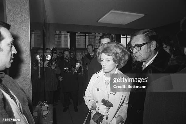 New York: Former cocktail waitress Alice Crimmins, and her attorney Herb Lyon, enter Queens Criminal Court where her new trial is scheduled to begin...