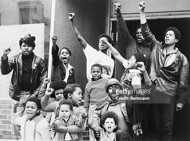 PANTHER POWER---BLACK PANTHERS, TEENAGERS AND CHILDREN ALIKE, GIVE THE PANTHER BLACK POWER SALUTE OUTSIDE THEIR "LIBERATION SCHOOL" IN THE FILLMORE...