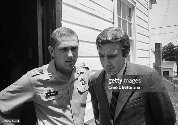 Ft. Bragg, N.C. ;: Captain Jerry MacDonald is shown in 7/17/70 file photo conferring with his attorney, Dennis Eisman, MacDonald was seized by...